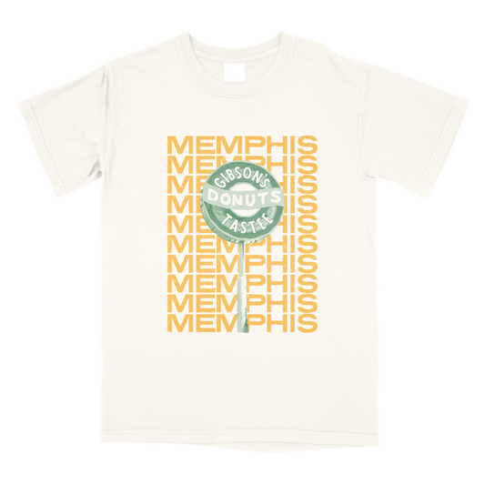 White t-shirt with Gibson's Donuts Halftone on Ivory graphic in yellow and green colors from Choose901 Merch Shop.