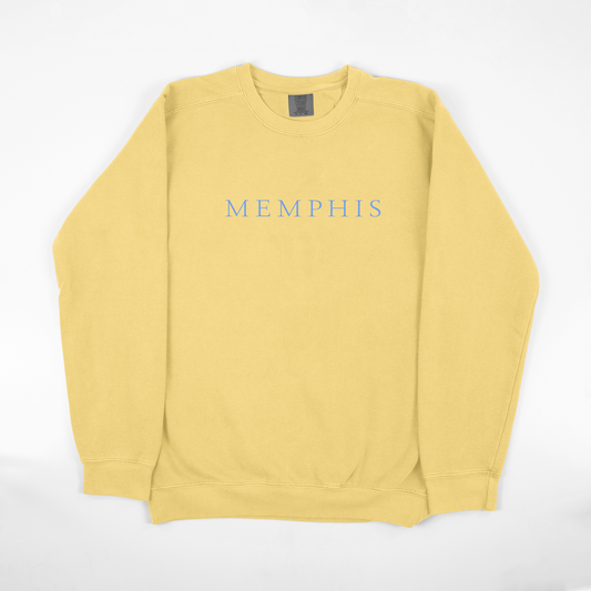 Yellow sweatshirt with "All Caps MEMPHIS" printed across the chest from Choose901 Merch Shop.