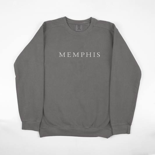 Gray sweatshirt with the word "All Caps MEMPHIS" printed across the chest from the Choose901 Merch Shop.