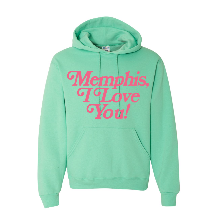 The limited edition Memphis I Love You Hoodie from Choose901 Merch Shop boasts cozy fleece fabric and a mint green color with bold pink "Memphis, I Love You!" text on the front.