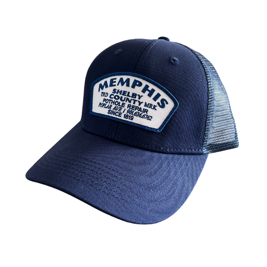 Navy blue Pothole Repair trucker hat with Choose901 Memphis patch from the Choose901 Merch Shop.
