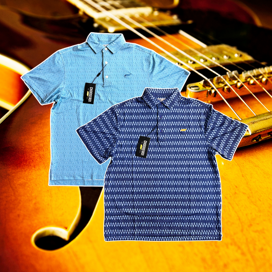 Two breathable polo shirts with tags from Choose901 Merch Shop, known as The Kings' Guitar Polo, are displayed against a close-up background of an acoustic guitar. One shirt is light blue and the other is dark blue with patterns.