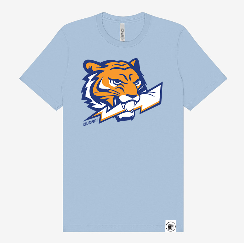 Introducing the Lightning Tiger Short Sleeve Tee from Choose901 Merch Shop: a stylish light blue t-shirt featuring a striking design of a tiger head biting a lightning bolt, complete with a small logo at the bottom. It's an ideal choice for any U of M supporter or fashion enthusiast.