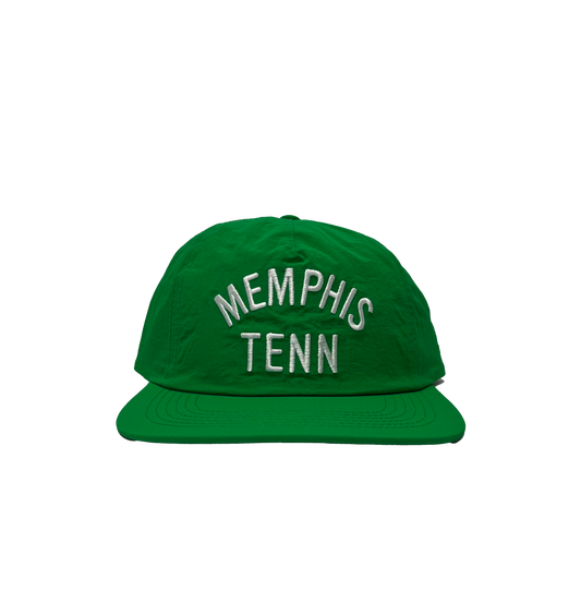 Memphis Tenn Nylon Hat Green with "901" embroidered in white, displayed against a striped gray and green background from Choose901 Merch Shop.
