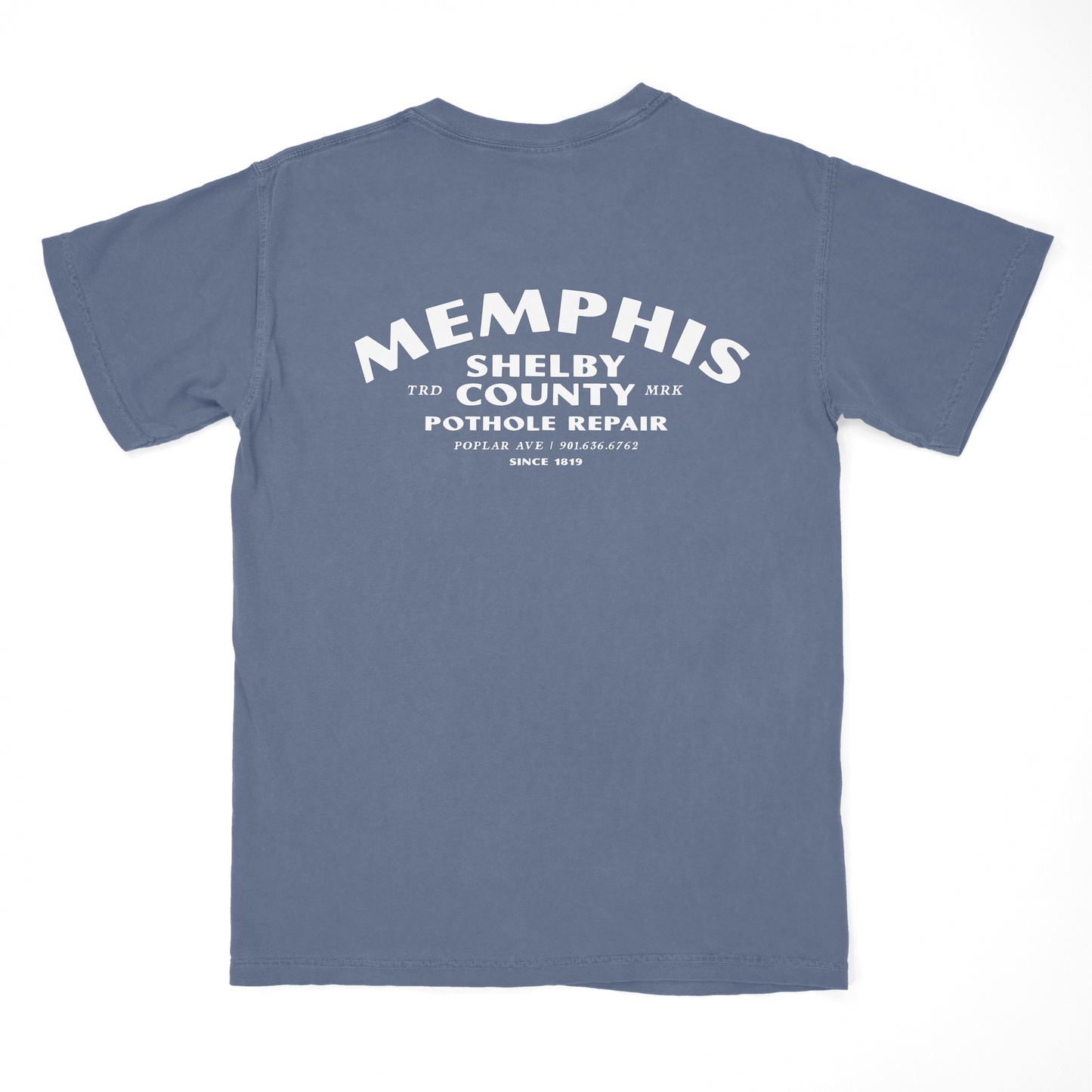 Introducing the Pothole Repair Short Sleeve Tee from the Choose901 Merch Shop, this blue Comfort Colors T-shirt displays white text that says "Memphis Shelby County Pothole Repair" and "Since 1919," complete with a phone number and address on the back for convenient contact.