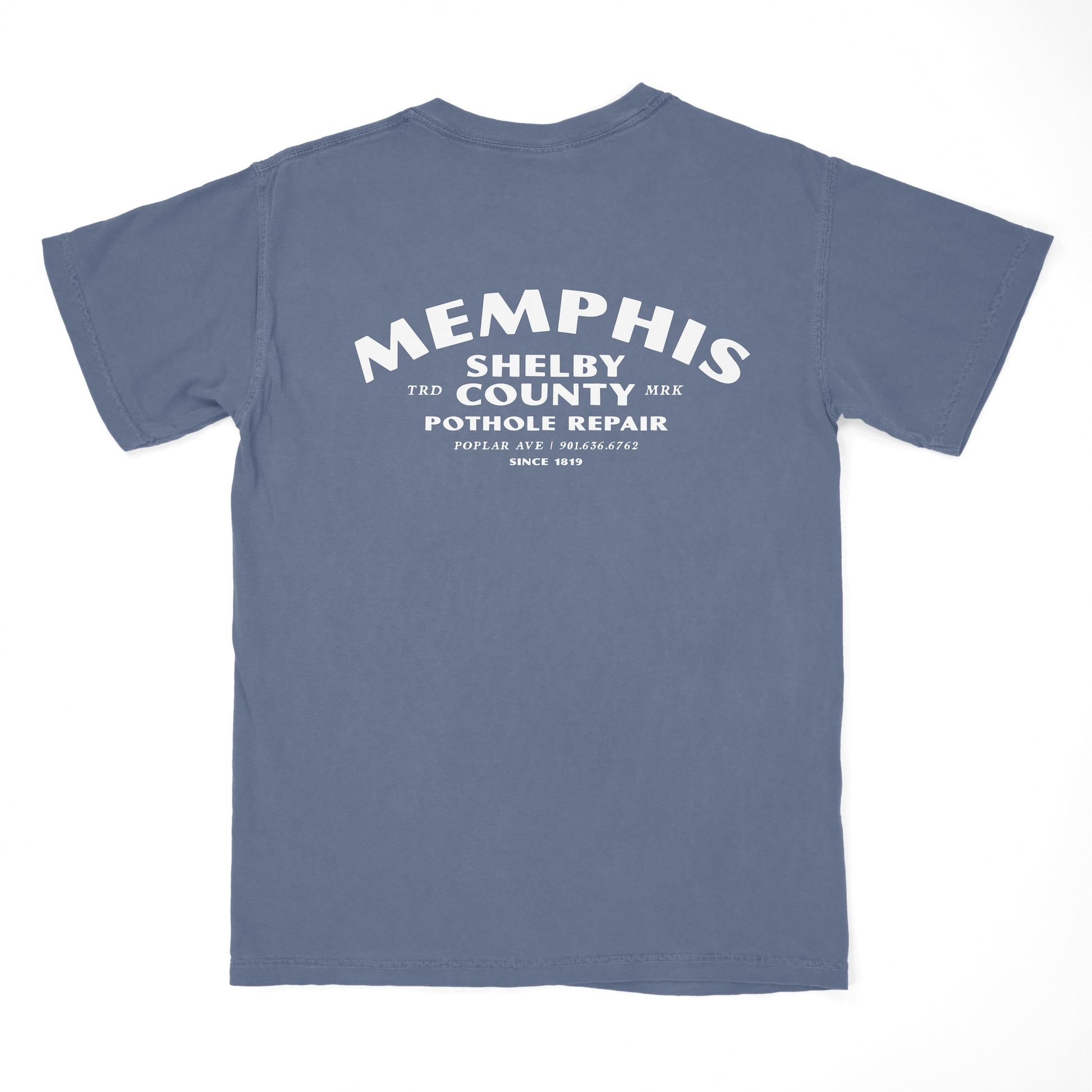 Introducing the Pothole Repair Short Sleeve Tee from the Choose901 Merch Shop, this blue Comfort Colors T-shirt displays white text that says "Memphis Shelby County Pothole Repair" and "Since 1919," complete with a phone number and address on the back for convenient contact.