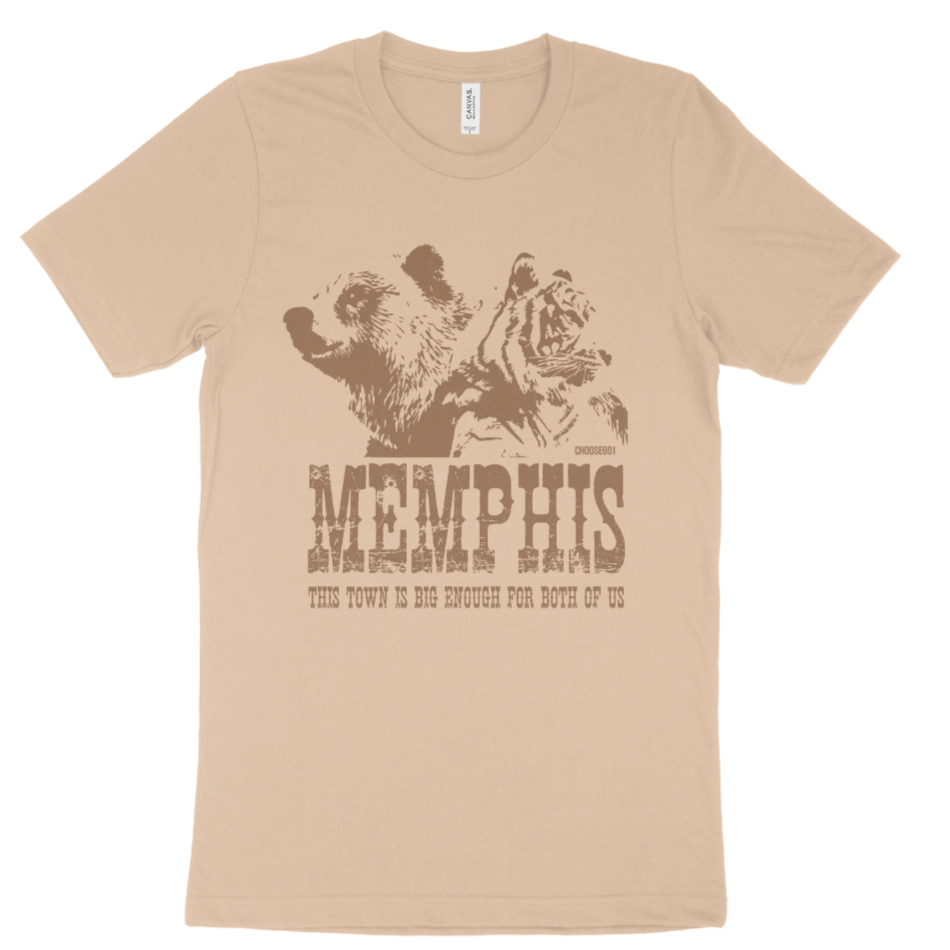 This stunning "The Both of Us" Tee from the Choose901 Merch Shop features a tan t-shirt adorned with an illustration of a bear and a tiger above the word "Memphis," along with the phrase "This town is big enough for both of us," perfectly capturing the essence of Memphis teams.