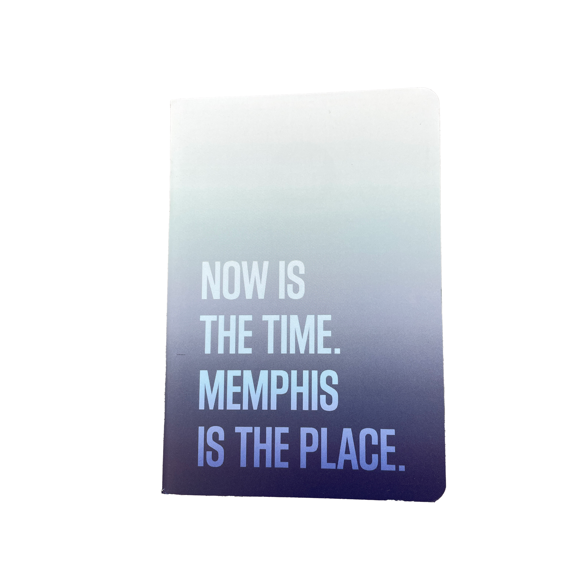 Introducing the Small Notebook from the Choose901 Merch Shop, a pocket-sized notebook with a stunning gradient cover transitioning from white to dark blue, emblazoned with the phrase: "NOW IS THE TIME. MEMPHIS IS THE PLACE.