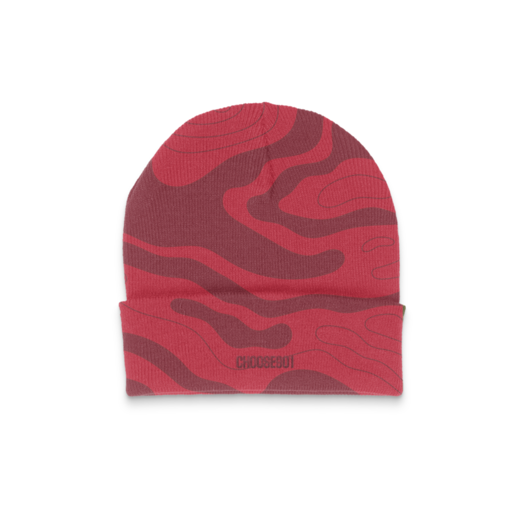 The "Something's in the Water Tech Beanie" from Choose901 Merch Shop, featuring a red and maroon abstract wavy pattern, is displayed against a plain white background.