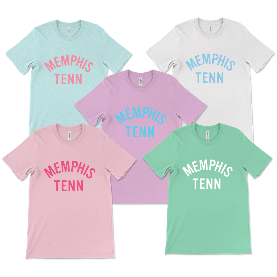 A collection of four MEMPHIS TENN TEE t-shirts, with "Choose901 Memphis" printed on them, displayed in various pastel colors.